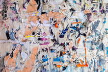 Wall With Scraps Of Old Paper As Background