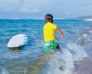 Canvas Print - Boy with surf