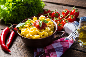 Tortellini with cheese sauce and vegetables