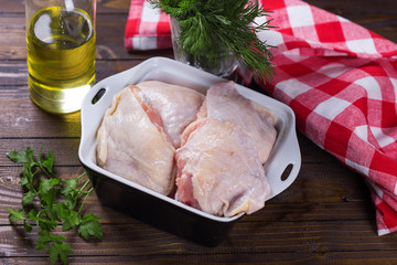 Wall Mural - Raw  chicken meat  on wooden table