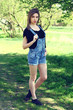 Beautiful young woman in dungarees