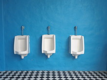  White Urinals In Men's Bathroom
