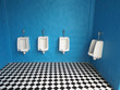  white urinals in men's bathroom