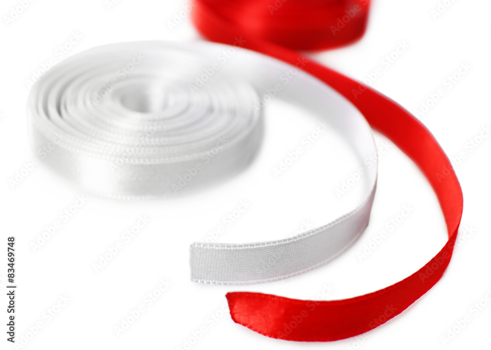 Colorful red and white ribbons isolated on white