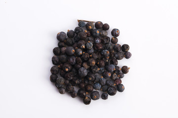 Wall Mural - Juniper berries on white background