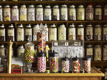 Traditional Sweets Displayed In Tall Glass Jars On The Shelves Of A Sweet Shop. 