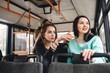 © mrcats - girls riding public transportation to work, study. show the way