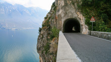 Italy, Lake Garda, Road Leading Into Mountain Tunnel