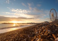 UK, England, East Sussex, Brighton Beach At Sunset