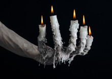 On The Hand Wearing A Candle And Dripping Melted Wax Studio