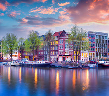 Colorful Spring Sunset On The Canals Of Amsterdam