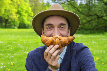 Man with croissant