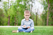© Masson - young boy with a books