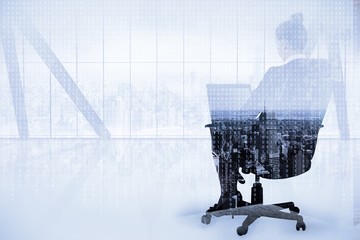 Poster - Businesswoman sitting on chair with laptop