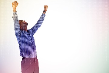 Wall Mural - Composite image of excited businessman cheering