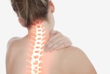 Fototapeta  - Highlighted spine of woman with neck pain