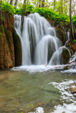 Fototapeta Natura - Waterfall in deep forest
