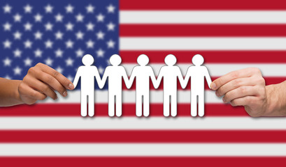 Wall Mural - hands holding people pictogram over american flag