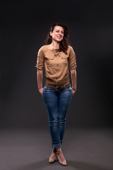 happy woman posing in studio