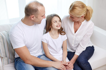 Poster - happy parents with little daughter at home