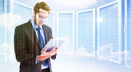 Poster - Composite image of businessman using a tablet computer