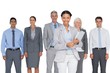 © WavebreakMediaMicro - Business people smiling at camera