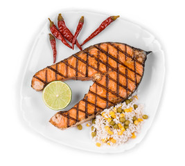 Canvas Print - Grilled salmon steak with vegetables on plate.