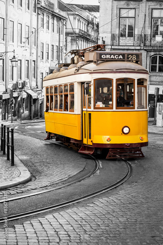 Naklejka na kafelki Famous yellow 28 tramway of Lisbon in Portugal