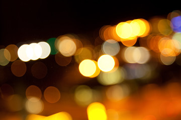 Wall Mural - golden bright lights on dark night background