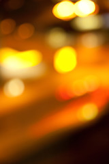 Wall Mural - golden bright lights on dark night background