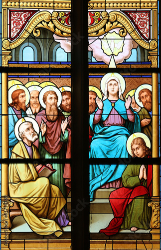 Fototapeta na wymiar Descent of the Holy Spirit, stained glass window in Basilica Assumption of the Virgin Mary in Marija Bistrica, Croatia