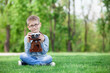 © Masson - young boy with a vintage camera
