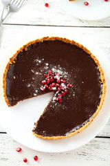 Canvas Print - Homemade chocolate tart with pomegranate 