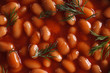 beans in tomato sauce with dill macro horizontal top view
