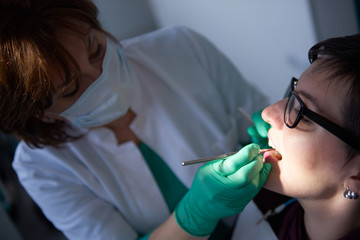 Wall Mural - woman patient at the dentist