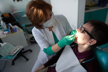 Wall Mural - woman patient at the dentist