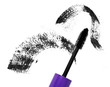 Mascara applicator with a smudge in the background