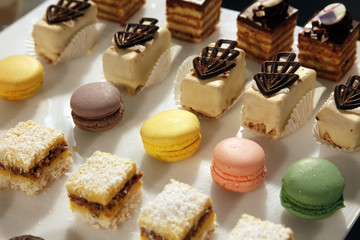 Colorful desserts and pastry served on a wedding party