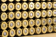 A Row Of 45 Caliber Ammunition Copper Plated Bullets