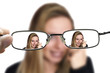 © grufnar - blonde woman blurred seen correctly through glasses