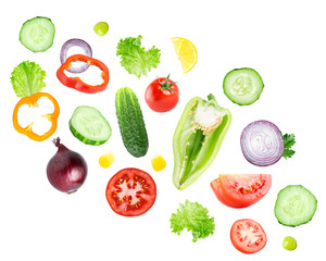 Canvas Print - Mixed falling vegetables on white background. Fresh salad