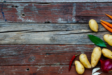 Wall Mural - Organic vegetables on rustic wooden table. 