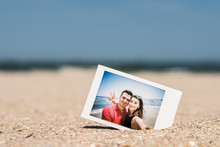 Polaroid Instant Photo Of Young Couple On The Beach