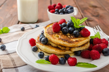 Wall Mural - Pancakes with forest fruit and mint