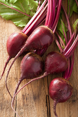 Wall Mural - fresh beetroot on wooden background