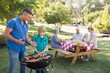 © WavebreakmediaMicro - Happy family having picnic in the park