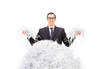 Sticker - Cheerful businessman holding shredded paper