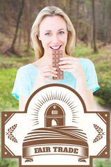 Poster - Composite image of smiling blonde eating bar of chocolate 