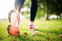 Highlighted Foot Bones Of Jogging Woman