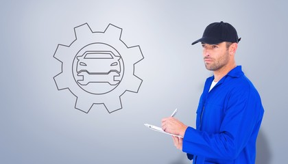 Poster - Composite image of mechanic writing on clipboar